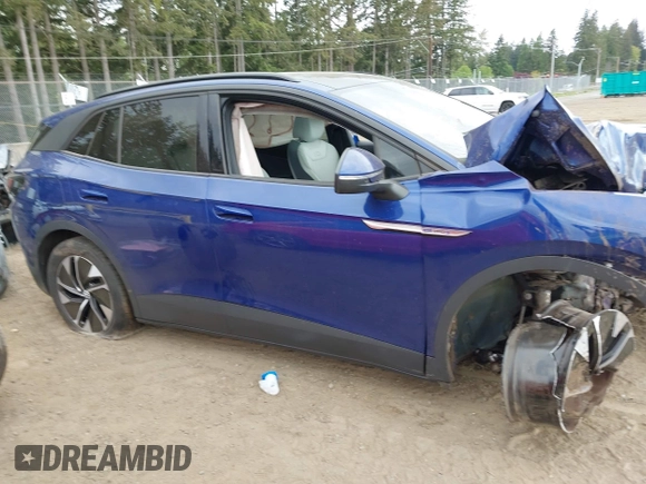 2022 Volkswagen ID.4 Pro S z VIN WVGGNPE26NP036269, wystawiony jako IAAI lot #42279904 z przebiegiem 43 959 mil mil oraz . Historia ofert i sprzedaży dostępna na DreamBid. Obrazek 14.