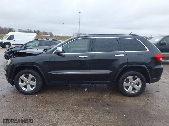 2013 Jeep Grand Cherokee Limited with VIN 1C4RJFBG4DC633137, listed as a IAAI auction lot 41235064 with 163,820 mi miles. Bid and sale history available at carsss.com. Image 15.
