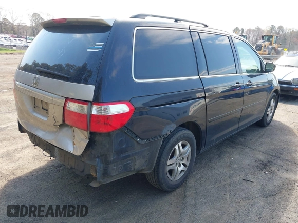 2005 Honda Odyssey EX-L with VIN 5FNRL38785B113074, listed as a IAAI auction lot 41907648 with 305,956 mi miles and . Bid and sale history available at DreamBid. Image 4.