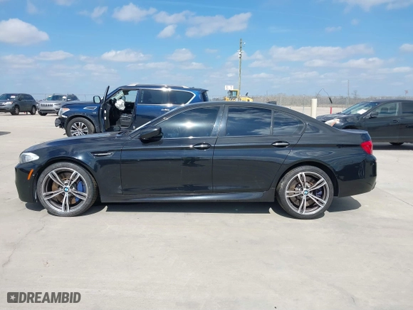 2013 BMW M5 with VIN WBSFV9C54DD095547, listed as a IAAI auction lot 41601733 with 1 mi miles. Bid and sale history available at carsss.com. Image 14.