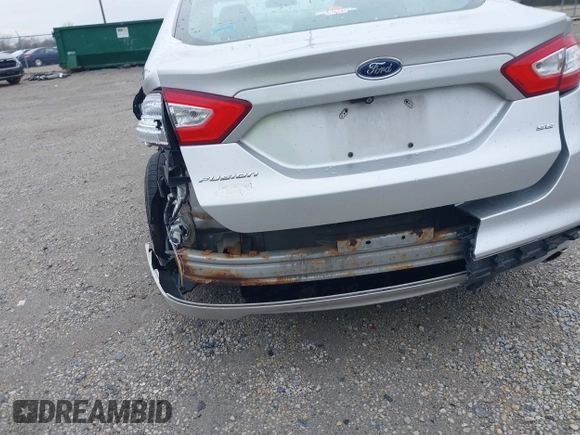 2015 Ford Fusion SE z VIN 1FA6P0H75F5112124, wystawiony jako IAAI lot #41957866 z przebiegiem 199 242 mil mil oraz . Historia ofert i sprzedaży dostępna na DreamBid. Obrazek 13.
