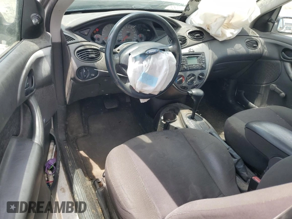 2003 Ford Focus ZX3 with VIN 3FAFP31383R117755, listed as a Copart auction lot 60668725 with 135,856 mi miles and Salvage title. Bid and sale history available at DreamBid. Image 8.