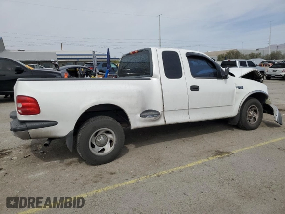 1999 Ford F-150 XL with VIN 1FTZX0721XKA49751, listed as a Copart auction lot 52429195 with Not provided miles and Salvage title. Bid and sale history available at DreamBid. Image 3.