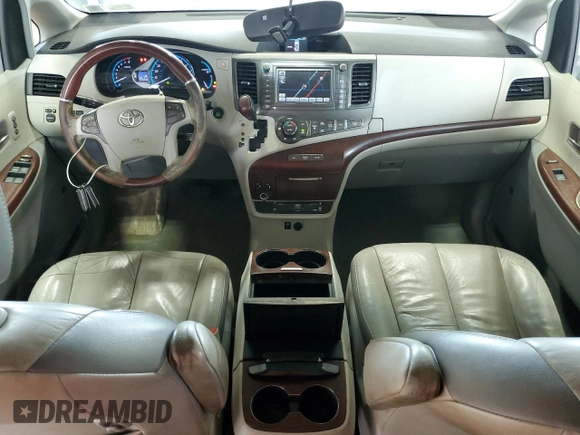 2011 Toyota Sienna XLE with VIN 5TDDK3DC7BS022837, listed as a Copart auction lot 60811445 with 210,732 mi miles and Salvage title. Bid and sale history available at DreamBid. Image 8.