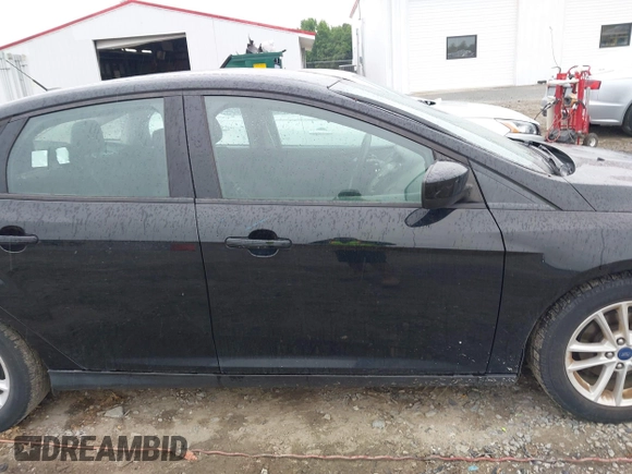 2018 Ford Focus SE with VIN 1FADP3F2XJL206441, listed as a IAAI auction lot 42341641 with 189,260 mi miles and . Bid and sale history available at DreamBid. Image 14.