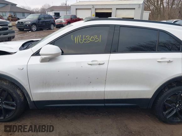 2019 Cadillac XT4 AWD Sport with VIN 1GYFZFR44KF146971, listed as a IAAI auction lot 41663031 with 129,248 mi miles and . Bid and sale history available at DreamBid. Image 14.