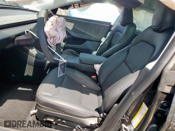 2025 Tesla Model 3 Long Range with VIN 5YJ3E1EB0SF921606, listed as a Copart auction lot 60728995 with 6,281 mi miles and Salvage title. Bid and sale history available at DreamBid. Image 7.