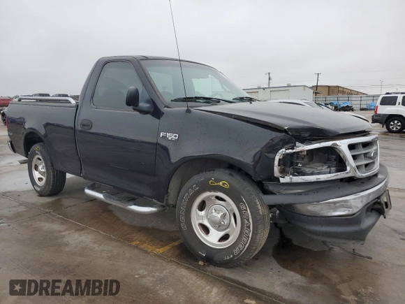 2000 Ford F-150 XL with VIN 3FTZF1728YMA63732, listed as a Copart auction lot 80010344 with Not provided miles and Salvage title. Bid and sale history available at DreamBid. Image 4.