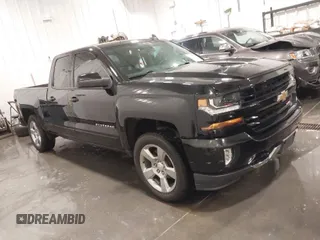 2018 Chevrolet Silverado 1500 LT with VIN 1GCVKREC4JZ295432, listed as a IAAI auction lot 41822705 with 86,781 mi miles and . Bid and sale history available at DreamBid. Image 1.