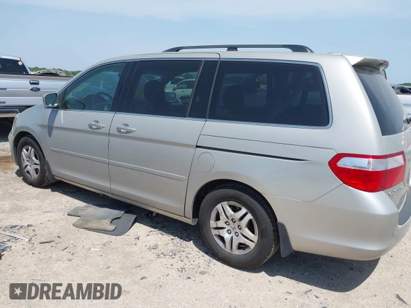 2007 Honda Odyssey EX-L with VIN 5FNRL38757B431334, listed as a IAAI auction lot 42026018 with 135,898 mi miles. Bid and sale history available at carsss.com. Image 3.