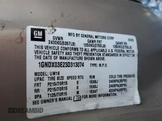 2003 Chevrolet Venture 1SA z VIN 1GNDX03E23D313074, wystawiony jako Copart lot #80559294 z przebiegiem 100 134 mil mil oraz Szkody całkowita. Historia ofert i sprzedaży dostępna na DreamBid. Obrazek 13.