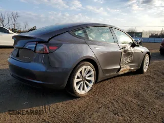 2023 Tesla Model 3 Long Range with VIN 5YJ3E1EBXPF660900, listed as a Copart auction lot 48923265 with 9,954 mi miles and Salvage Title. Bid and sale history available at DreamBid. Image 3.