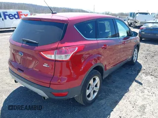 2013 Ford Escape SE with VIN 1FMCU9GX3DUB27683, listed as a IAAI auction lot 42068155 with 94,924 mi miles and . Bid and sale history available at DreamBid. Image 4.