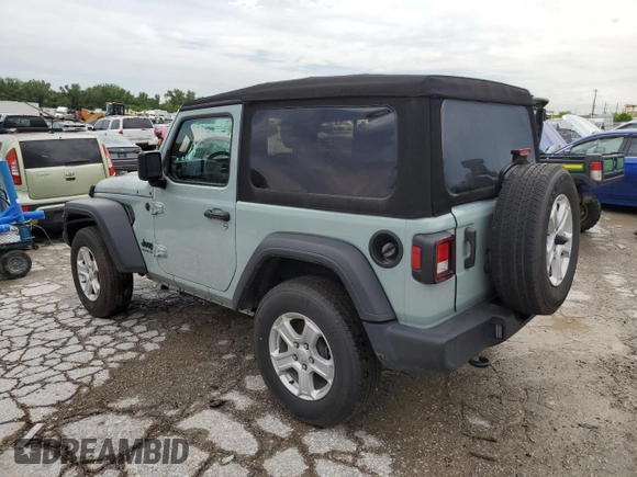 2023 Jeep Wrangler Sport with VIN 1C4HJXAG0PW595881, listed as a Copart auction lot 65590025 with 19,597 mi miles and Salvage title. Bid and sale history available at DreamBid. Image 2.