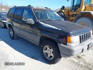 1996 Jeep Grand Cherokee Laredo with VIN 1J4GZ58S3TC345107, listed as a IAAI auction lot 41661884 with 179,175 mi miles. Bid and sale history available at carsss.com. Image 1.