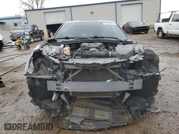 2020 Chevrolet Camaro 1LT с VIN 1G1FB1RS4L0128821, выставлен на аукционе Copart как лот 87812975 с пробегом Не указан миль и На запчасти • Non repairable. История ставок и продаж доступна на DreamBid. Изображение 5.