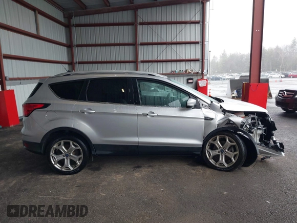 2019 Ford Escape Titanium with VIN 1FMCU9J9XKUA37695, listed as a IAAI auction lot 41868388 with 50,095 mi miles. Bid and sale history available at carsss.com. Image 13.