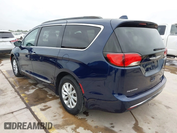 2017 Chrysler Pacifica Touring L with VIN 2C4RC1BG2HR526422, listed as a IAAI auction lot 42032839 with 180,710 mi miles and . Bid and sale history available at DreamBid. Image 3.