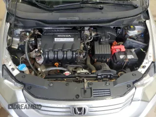 2010 Honda Insight LX z VIN JHMZE2H5XAS018546, wystawiony jako Copart lot #61411545 z przebiegiem 55 814 mil mil oraz Czysty tytuł • Clean title. Historia ofert i sprzedaży dostępna na DreamBid. Obrazek 11.
