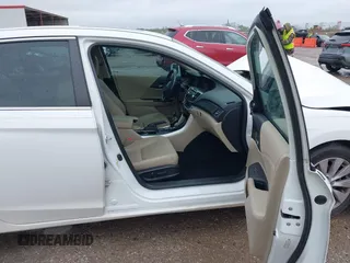2014 Honda Accord EX-L with VIN 1HGCR2F82EA195419, listed as a IAAI auction lot 41967410 with 228,604 mi miles and . Bid and sale history available at carsss.com. Image 5.