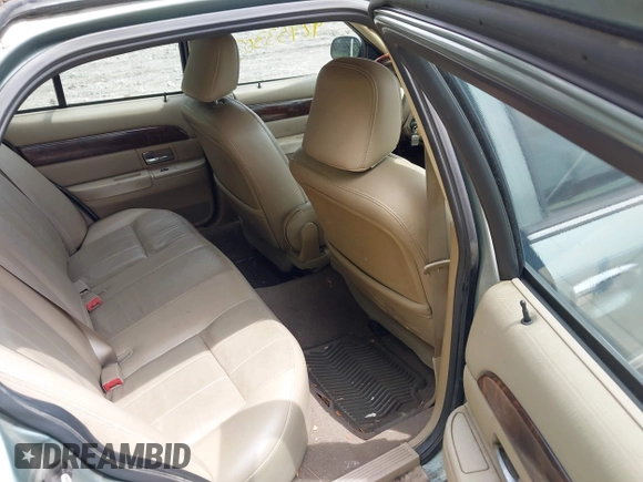 2005 Mercury Grand Marquis LS Premium z VIN 2MHHM75W95X607697, wystawiony jako IAAI lot #42453303 z przebiegiem 142 879 mil mil oraz . Historia ofert i sprzedaży dostępna na DreamBid. Obrazek 8.