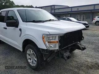 2021 Ford F-150 XL with VIN 1FTEW1C53MFB80059, listed as a Copart auction lot 58835805 with 85,998 mi miles and Salvage title. Bid and sale history available at DreamBid. Image 14.