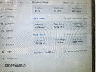 2017 Tesla Model S 60 with VIN 5YJSA1E15HF223354, listed as a Copart auction lot 60064725 with 60,403 mi miles and Salvage title. Bid and sale history available at DreamBid. Image 9.