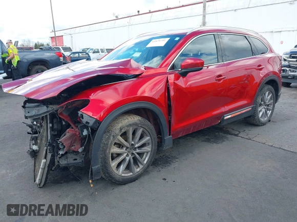 2020 Mazda CX-9 Grand Touring with VIN JM3TCBDY4L0423563, listed as a IAAI auction lot 41829394 with 76,704 mi miles and . Bid and sale history available at DreamBid. Image 21.
