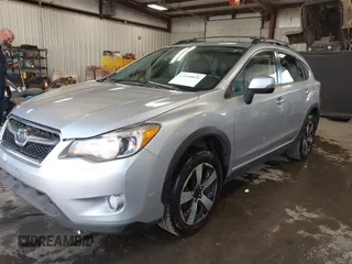 2014 Subaru Crosstrek Touring with VIN JF2GPBKC0EH312164, listed as a IAAI auction lot 42348820 with 214,494 mi miles and . Bid and sale history available at DreamBid. Image 2.