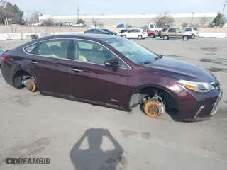 2016 Toyota Avalon Hybrid XLE Premium with VIN 4T1BD1EB3GU052685, listed as a IAAI auction lot 41395731 with 118,784 mi miles. Bid and sale history available at carsss.com. Image 1.