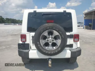 2016 Jeep Wrangler Unlimited Sahara with VIN 1C4BJWEG6GL182794, listed as a Copart auction lot 57880725 with 127,752 mi miles and Salvage title. Bid and sale history available at DreamBid. Image 6.