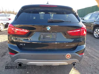 2018 BMW X1 xDrive28i with VIN WBXHT3C36J5L29746, listed as a IAAI auction lot 41547100 with 103,420 mi miles and . Bid and sale history available at DreamBid. Image 16.
