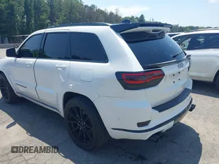 2019 Jeep Grand Cherokee Summit with VIN 1C4RJFJT1KC785744, listed as a IAAI auction lot 42645006 with 38,483 mi miles and . Bid and sale history available at DreamBid. Image 3.