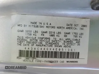 2004 Mitsubishi Eclipse GS with VIN 4A3AC44GX4E051361, listed as a Copart auction lot 77691064 with 56,598 mi miles and Salvage Title. Bid and sale history available at carsss.com. Image 12.