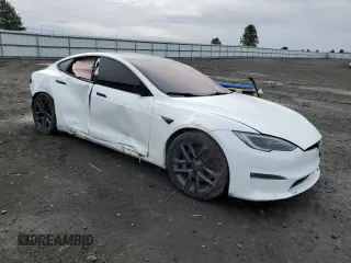 2022 Tesla Model S Plaid with VIN 5YJSA1E62NF490541, listed as a Copart auction lot 51149205 with Not provided miles and Salvage title. Bid and sale history available at DreamBid. Image 4.