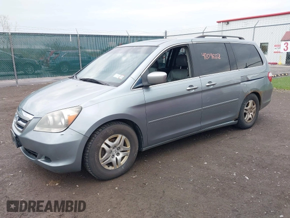 2005 Honda Odyssey EX-L with VIN 5FNRL38675B133498, listed as a IAAI auction lot 42046228 with 257,985 mi miles. Bid and sale history available at carsss.com. Image 2.