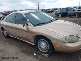 1997 Mercury Sable LS with VIN 1MELM53S8VA602057, listed as a IAAI auction lot 41468005 with 71,203 mi miles. Bid and sale history available at carsss.com. Image 6.