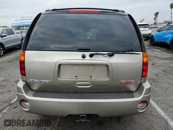 2003 GMC Envoy SLE with VIN 1GKDS13S232236886, listed as a Copart auction lot 43220545 with 58,229 mi miles and Salvage Title. Bid and sale history available at carsss.com. Image 6.