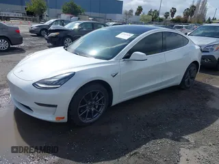 2020 Tesla Model 3 Long Range with VIN 5YJ3E1EB6LF619528, listed as a IAAI auction lot 41937430 with 70,327 mi miles. Bid and sale history available at carsss.com. Image 2.