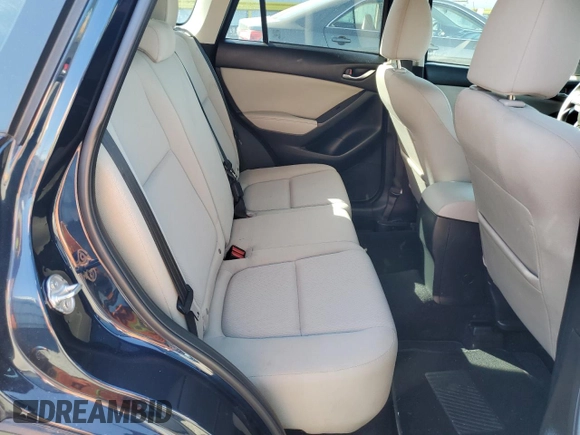 2015 Mazda CX-5 Sport with VIN JM3KE2BEXF0483141, listed as a Copart auction lot 59134105 with 71,727 mi miles and Salvage title. Bid and sale history available at DreamBid. Image 11.