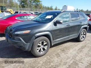 2014 Jeep Cherokee Trailhawk with VIN 1C4PJMBS3EW127749, listed as a IAAI auction lot 41836617 with 207,002 mi miles and . Bid and sale history available at DreamBid. Image 21.