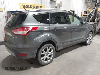 2016 Ford Escape Titanium with VIN 1FMCU9J93GUC39933, listed as a IAAI auction lot 42616323 with 116,482 mi miles and . Bid and sale history available at DreamBid. Image 4.