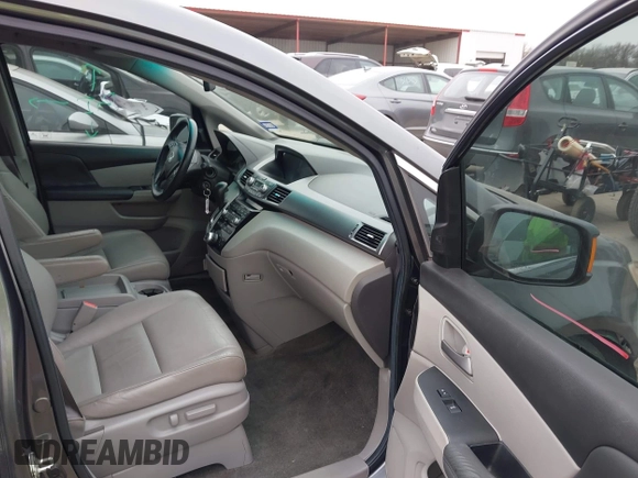 2012 Honda Odyssey Touring with VIN 5FNRL5H96CB138548, listed as a IAAI auction lot 41471856 with 186,284 mi miles and . Bid and sale history available at DreamBid. Image 5.