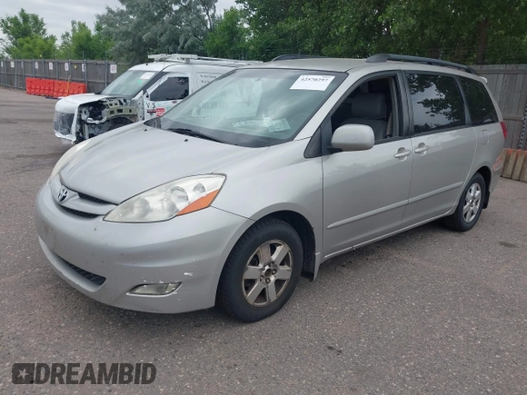 2008 Toyota Sienna XLE with VIN 5TDZK22C28S100727, listed as a IAAI auction lot 42570297 with 184,422 mi miles and . Bid and sale history available at DreamBid. Image 2.