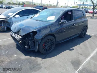 2013 Volkswagen GTI with VIN WVWHD7AJ4DW131183, listed as a IAAI auction lot 42057184 with 115,241 mi miles. Bid and sale history available at carsss.com. Image 2.