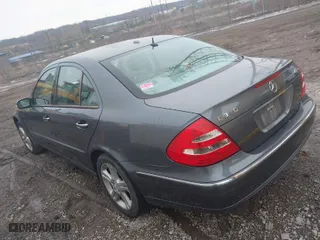 2006 Mercedes-Benz E-Class 3.5L with VIN WDBUF87J26X207923, listed as a IAAI auction lot 41479006 with 154,024 mi miles. Bid and sale history available at carsss.com. Image 3.