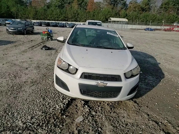 2016 Chevrolet Sonic LS with VIN 1G1JA6SH3G4169464, listed as a Copart auction lot 81033884 with 107,742 mi miles and Salvage Title. Bid and sale history available at carsss.com. Image 10.