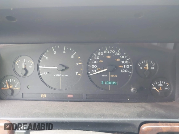 1997 Jeep Grand Cherokee Limited z VIN 1J4GZ78S1VC536295, wystawiony jako IAAI lot #42435292 z przebiegiem 310 005 mil mil oraz . Historia ofert i sprzedaży dostępna na DreamBid. Obrazek 7.