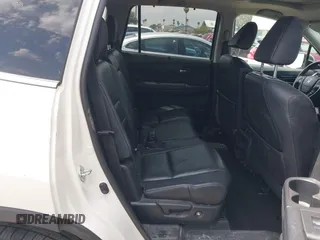 2017 Honda Pilot Touring with VIN 5FNYF5H95HB042632, listed as a IAAI auction lot 42011885 with 103,321 mi miles. Bid and sale history available at carsss.com. Image 8.