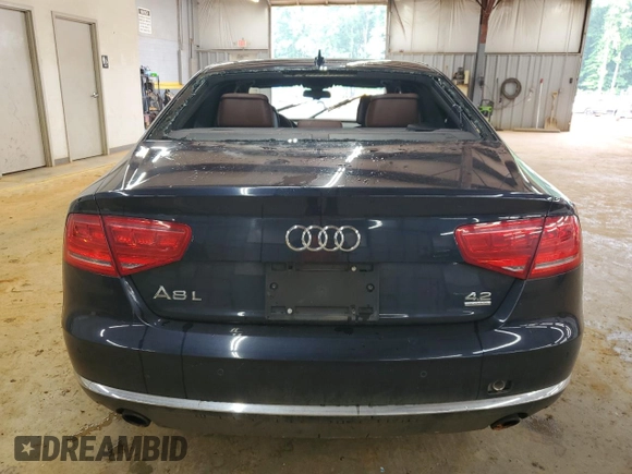 2011 Audi A8 z VIN WAURVAFD4BN005925, wystawiony jako Copart lot #56998325 z przebiegiem 147 449 mil mil oraz Tytuł czysty. Historia ofert i sprzedaży dostępna na DreamBid. Obrazek 6.